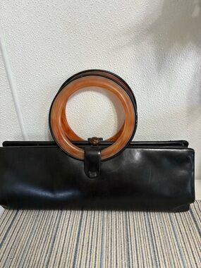 Vintage BlackLeather Handbag with Amber Lucite tortoise Ring Handle